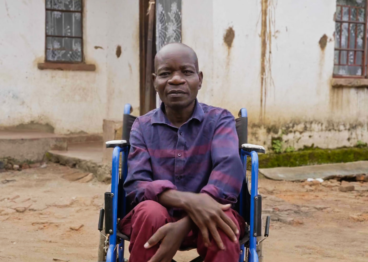 Man on a wheelchair in Malawi