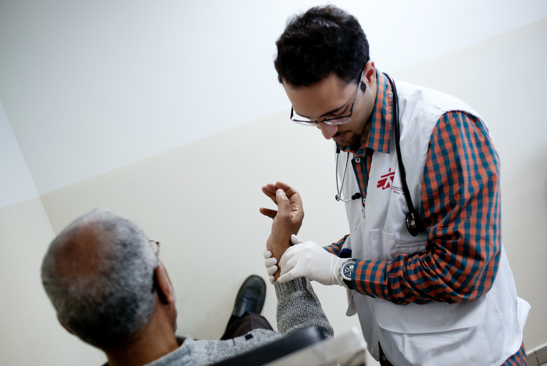 Mohamed 64 years old from Damascus during his medical consultation with MSF doctor. © N'gadi Ikram / Courtesy of MSF
