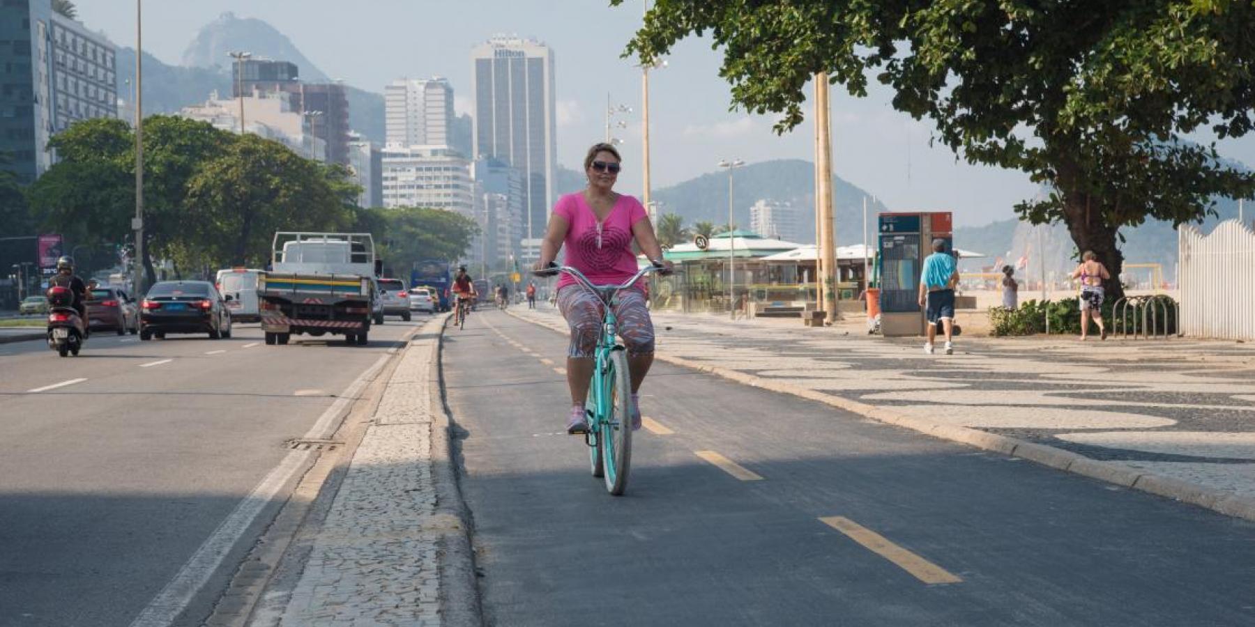 Woman cycling in Brazil. Photo by World Obesity Federation
