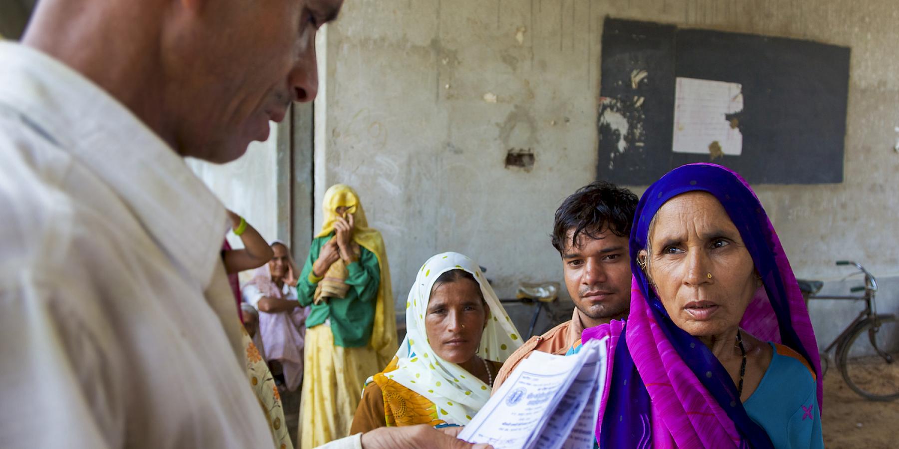Indian senior patient queuing to have a free medical consultation in Agra, India 2010