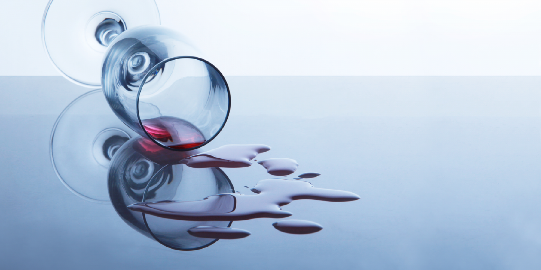 spilt glass of alcohol wine