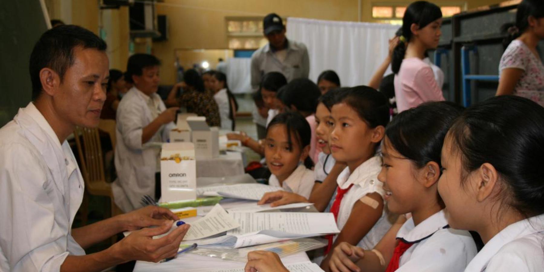 School girls at an HPV vaccination campaign event in Vietnam