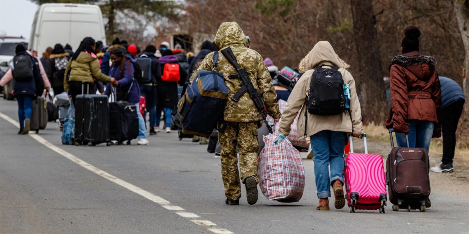 Refugees walking in Ukraine