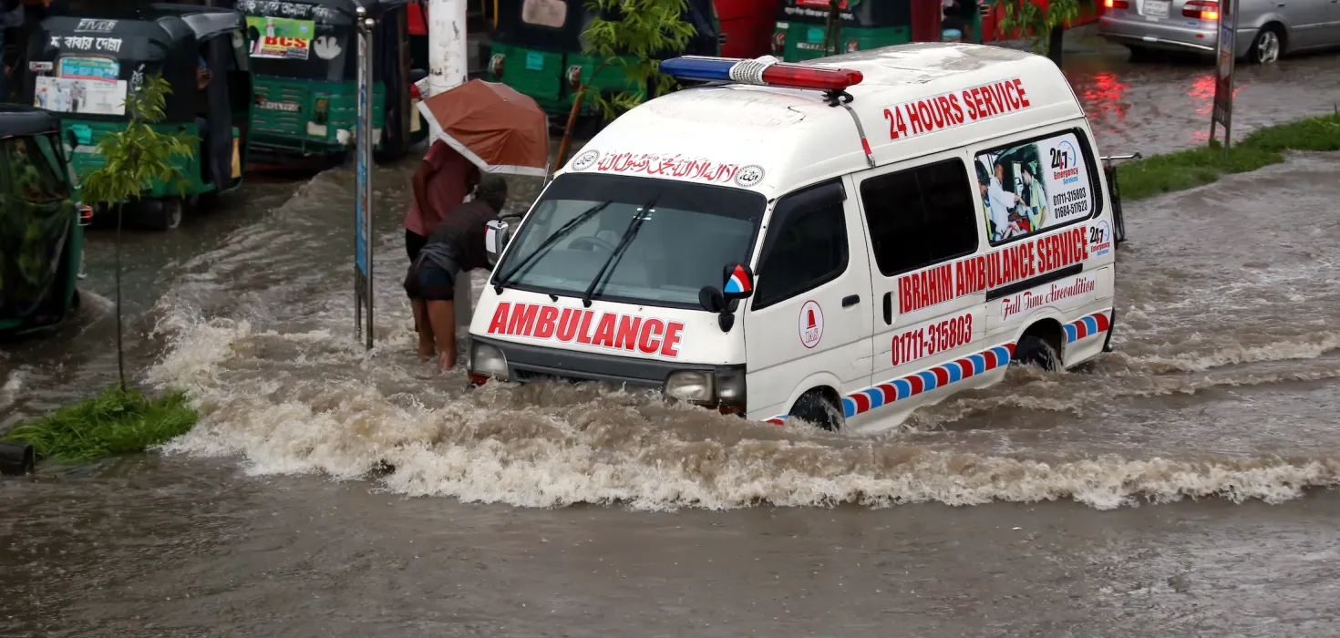 Ambulance stuck in flooded street in Bangladesh 