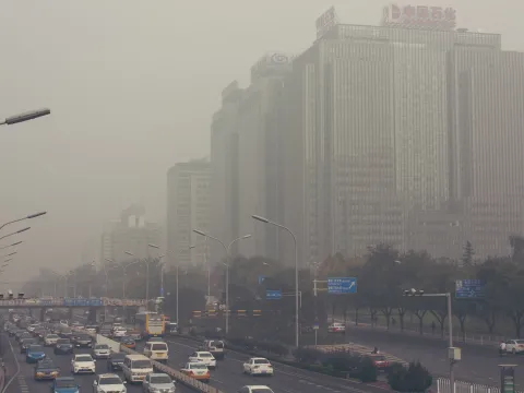 Air pollution in a city in China full of cars