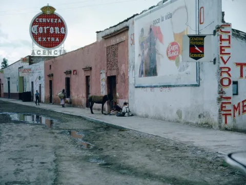 Big alcohol brand advertising in an unpaved road in Guadalajara, Mexico 