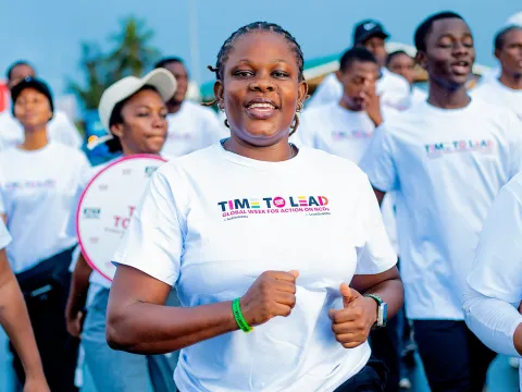 Woman running in an event organised by Tanzania NCD Alliance in the context of the Global Week for Action 2024