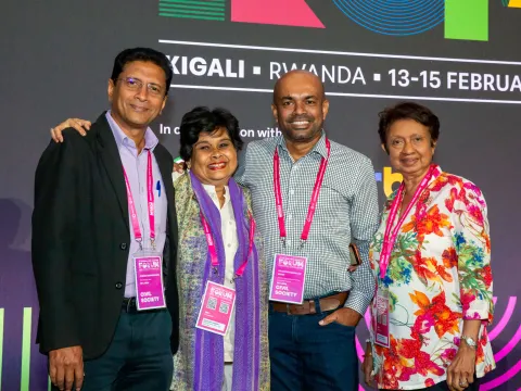 smiling people at the plenary of global ncd alliance forum