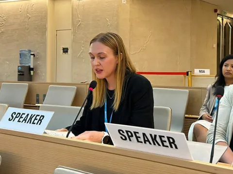 Speaker at the World Health Organization in Geneva reading text