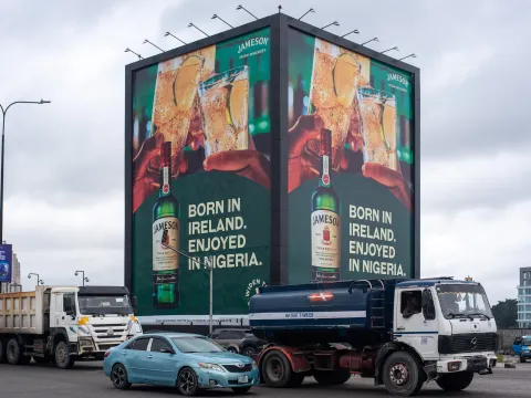 Big alcohol advertising in a Nigerian highway 