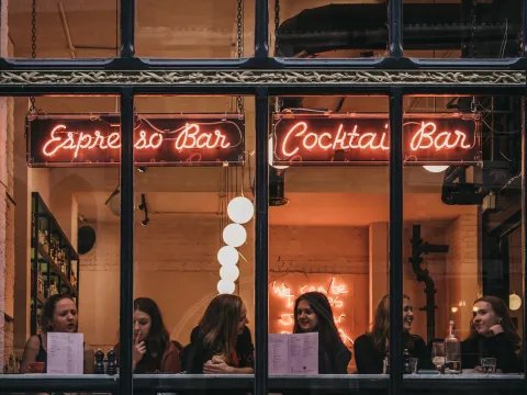 Women at a cocktail bar in London 