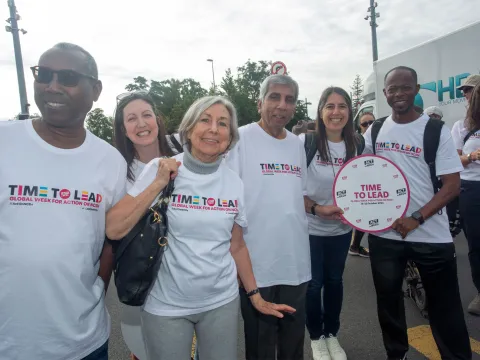 NCD advocates at Walk the Talk in Geneva smiling for Time to Lead campaign