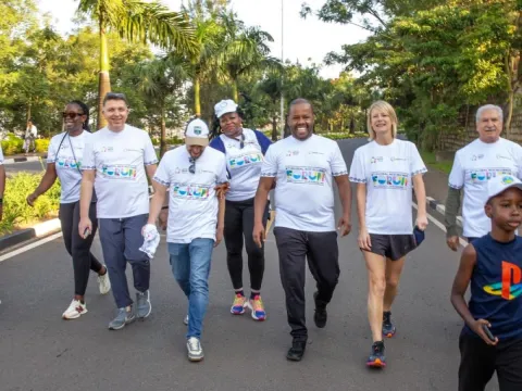 NCD Alliance CEO, Katie Dain, and Mayor of Kigali, Samuel Dusengiyumva, walking during Kigali Car Free Day on 16 February 2025 