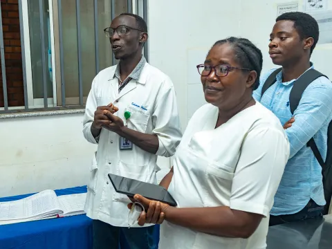 Nurse, doctor and Naasson Nduwamungu at Masaka District Hospital