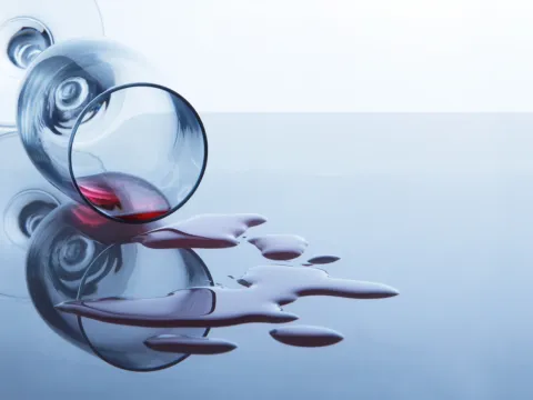 spilt glass of alcohol wine