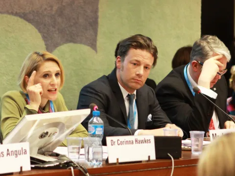 Corinna Hawkes and Jamie Oliver Speak at WHA69 Nutrition Side Event blog header.png