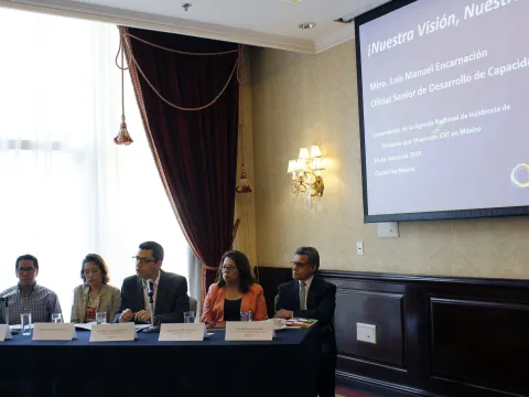 Panel sitting at desk for the launch of Mexican Advocacy Agenda