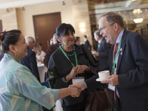 People networking over coffee at the Global NCD Alliance Forum 2015, Sharjah (UAE)