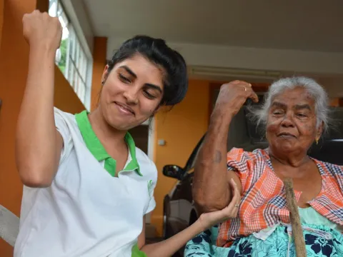 Occupational Therapist Karishma works with one of her patients in Bon Acceuil, Mauritius. 