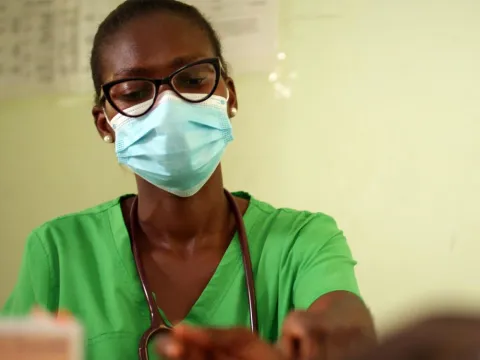 A healthworker in Ghana