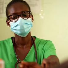 A healthworker in Ghana