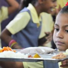 Photo of a child in the healthy eating programme for primary school children in Puerto Rico