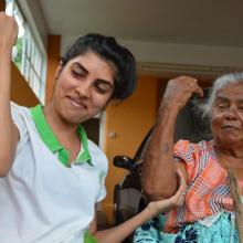 Occupational Therapist Karishma works with one of her patients in Bon Acceuil, Mauritius. 
