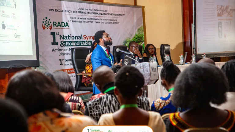 NCD advocate from Cameroon speaking at a symposium on NCDs