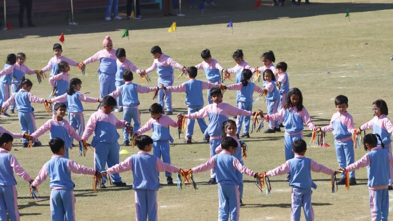Children in India doing physical activity outdoors