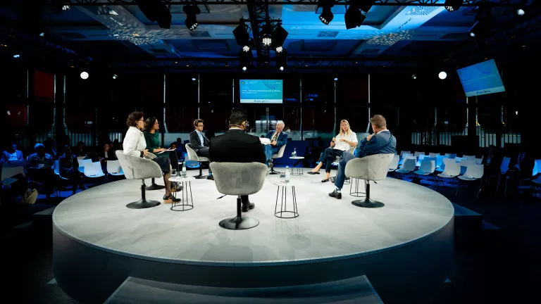 Picture of panel discussion at WHS 2026 featuring NCDA CEO Katie Dain, NCD advocate Mohammed Seyam and others 