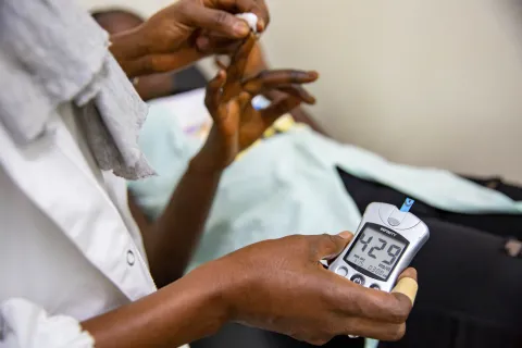 Glucometer display shows blood sugar level