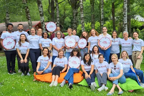 NCDA team smiling for photo in Chamonix