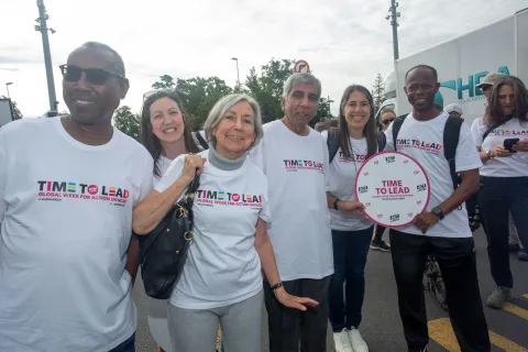 NCD advocates at Walk the Talk in Geneva smiling for Time to Lead campaign