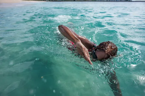 woman swimming in Barbados