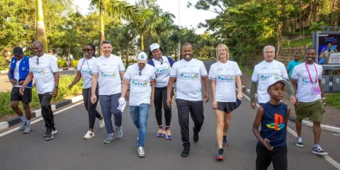 NCD Alliance CEO, Katie Dain, and Mayor of Kigali, Samuel Dusengiyumva, walking during Kigali Car Free Day on 16 February 2025 