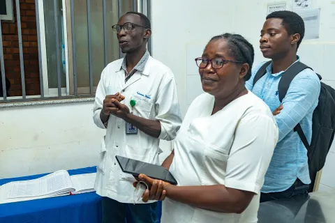 Nurse, doctor and Naasson Nduwamungu at Masaka District Hospital