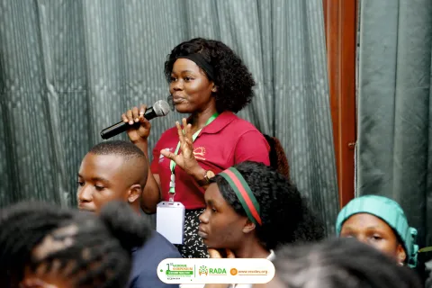 A woman from Cameroon intervenes at an event on NCDs
