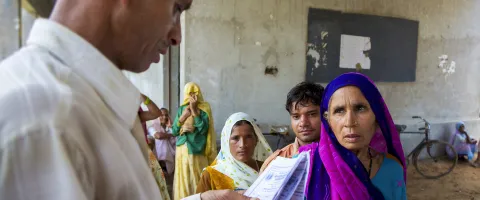 Indian senior patient queuing to have a free medical consultation in Agra, India 2010