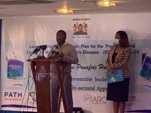 Man speaking at podium