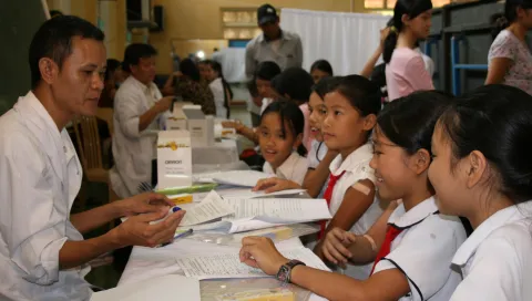 School girls at an HPV vaccination campaign event in Vietnam