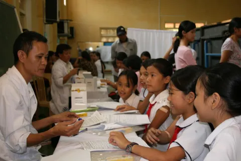 School girls at an HPV vaccination campaign event in Vietnam