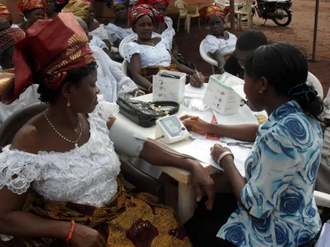 A community health worker gives a health talk on malaria in Agbor, Delta State, Nigeria