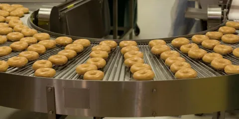 Image of production line with doughuts