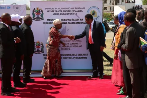 Tanzania Prime Minister Kassim Majaliwa congratulating the Minister of Health, Hon Ummy Mwalimu