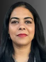 women of Asian descent smiling for portrait