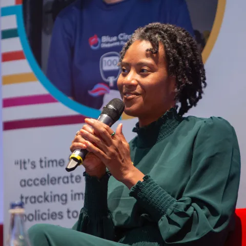 loyce pace at ncd alliance event talking on stage 